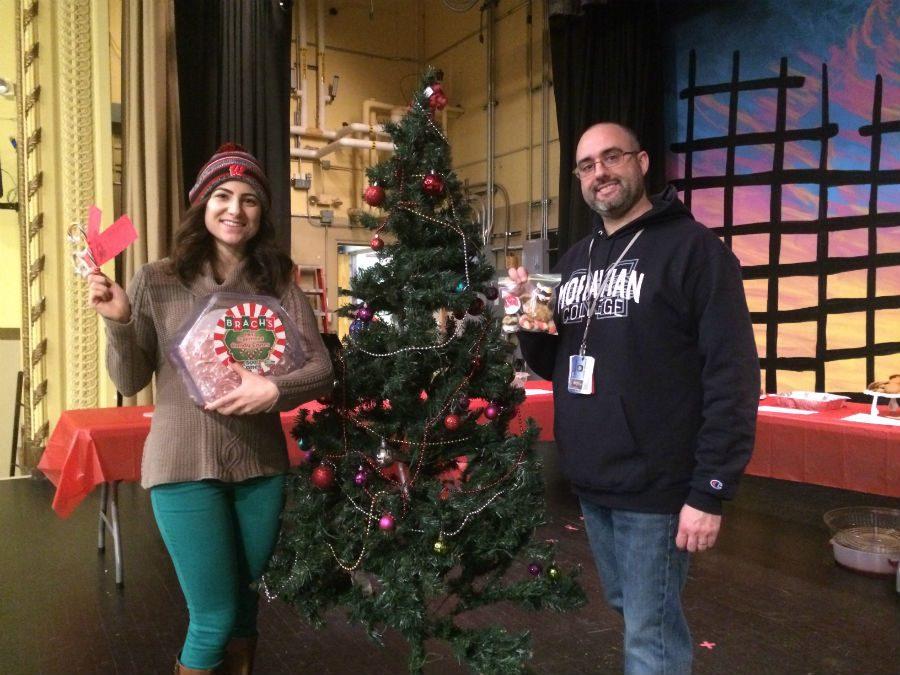 Ms. DOrsi and Mr. Blasena posing at the festive  Cookie Sale 