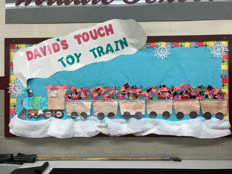 The Davids Touch train hanging in the cafeteria, keeping track of how many toys were collected.