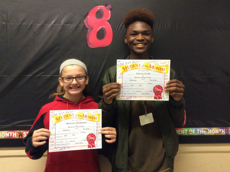 EIGHTH GRADE STUDENTS OF THE MONTH: Shannon Muldowney and Charles Crook receive the first eighth grade student of the month award of the year