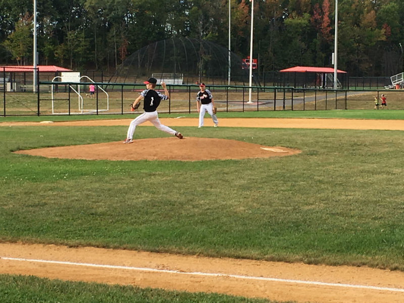 Brett Lukachyk ,#1,  pitching his team to a win.  