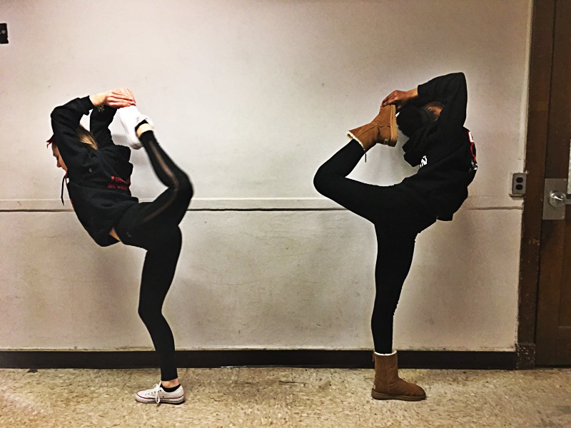 WMS CHEERLEADERS SHOWS OFF ONE OF THEIR SKILLS:  The 8th grade ILLS:  The 8th grade cheerleaders Alexis Lyczkowski and Daniela Burton both are ready to put in some tricks at the boys and girls baseball game.