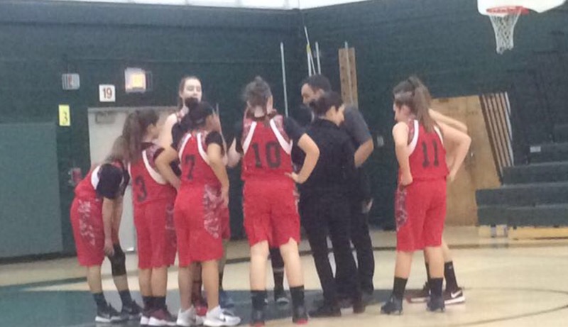 HUDDLE: Coaches Murphy and D’Orsi pumping up their players before a game.