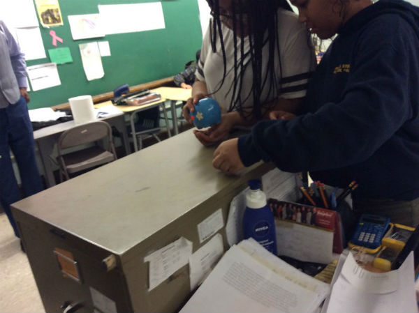 MRS. MOORJANIS BLOCK 1 MATH CLASS: Inspecting their piggy bank to see if it is ready to be opened