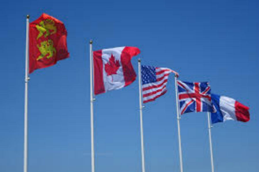 Photo via http://maxpixel.freegreatpicture.com/Flags-Country-French-Flag-Sky-France-Blue-Wind-2797516 under the Creative Commons License