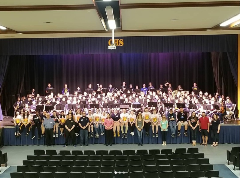 MIDDLE SCHOOL BAND DAY:  The music teachers and students of Woodbridge sit proudly at the stage of Colonia High School.