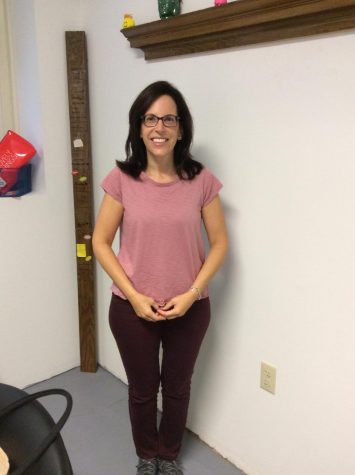 Ms.Falcone takes the September 6th teacher of the month award