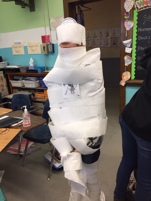 MUMMIFICATION: A student fully mummified.
