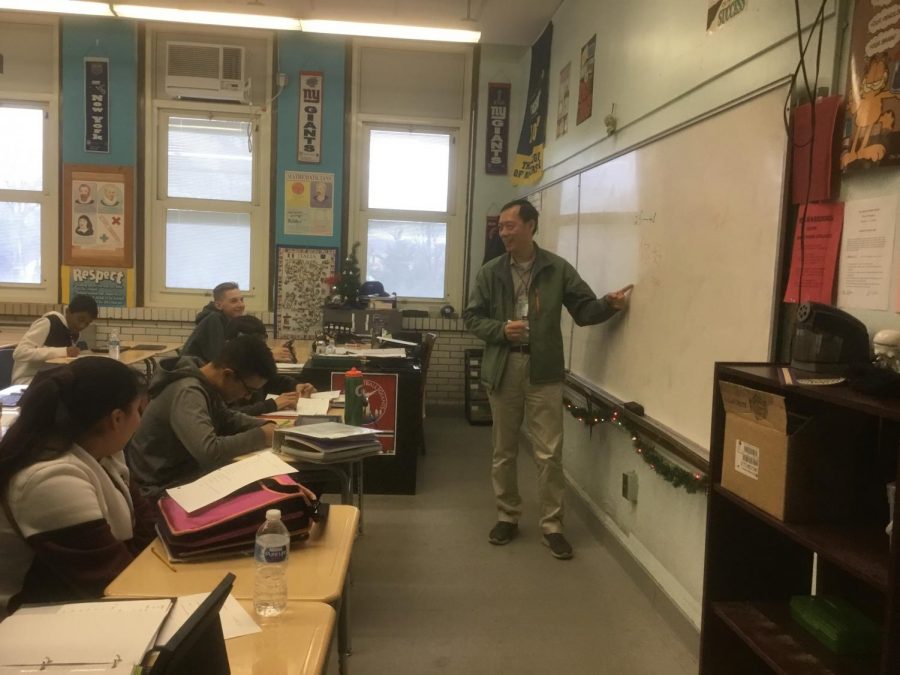 CHINESE: Mr. Liu enthusiastically teaches his class Chinese.