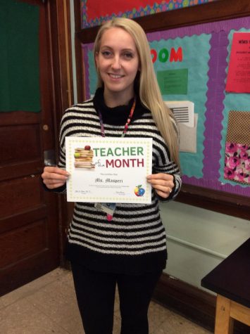 Ms. Masperi wins the 8th grade teacher of the month award for October