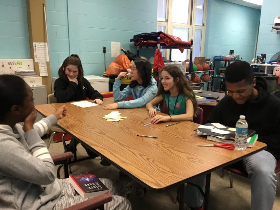 7th grade G&T students playing a word game as a warm-up for class