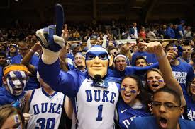 Duke fans experiencing the madness.
Photo Via https://commons.wikimedia.org/wiki/File:20131203_Cameron_Crazies.jpg