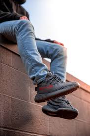 Labeled for Reuse via https://www.pexels.com/photo/person-wearing-adidas-yeezy-boost-shoes-1102776/ under the Creative Commons License 