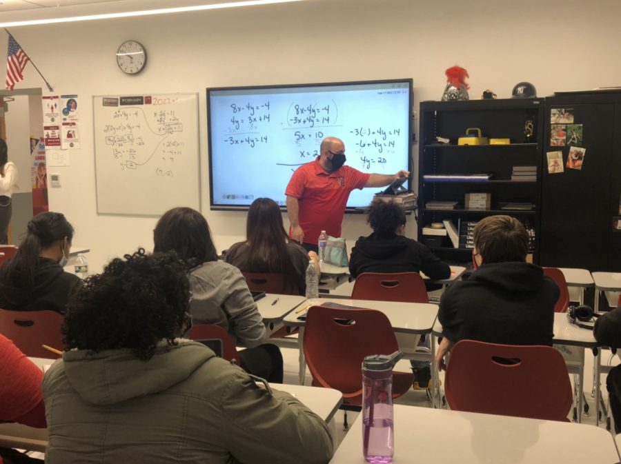 TWO PLUS TWO EQUALS FUN : WMS 8th grade math teacher Mr. Maneri teaches his first block students Algebra. 