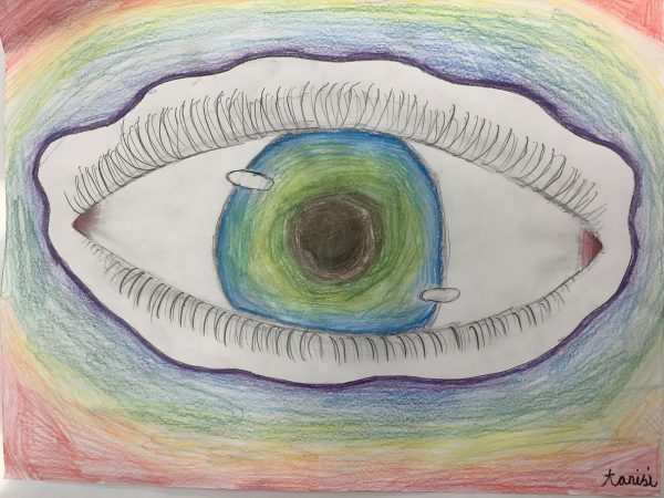 This is a drawing of an eye surrounded by colors made by Tanisi Mistry.
