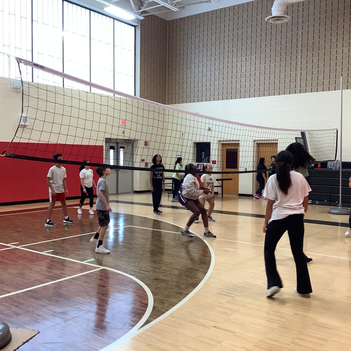WMS students play a game of volleyball in 6th period. 


