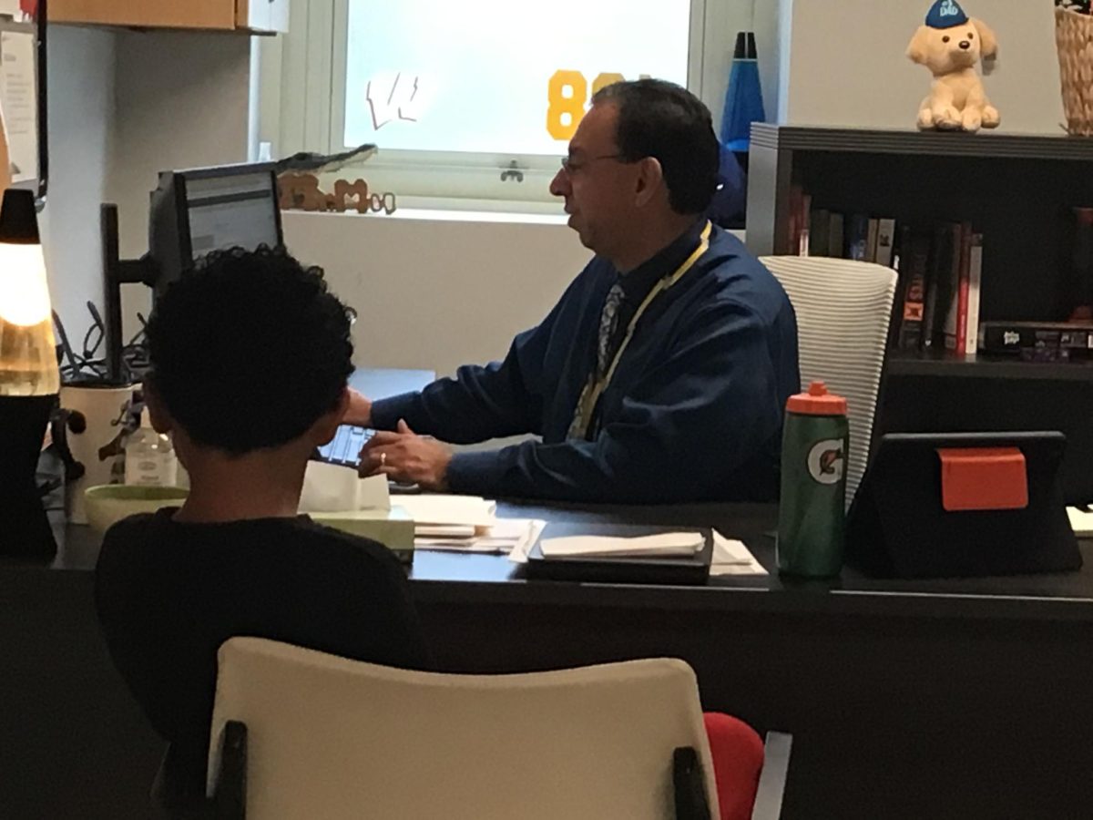 A WMS student is talking to the counselor Mr Musacchio during 2nd block

