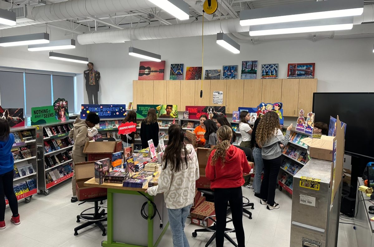 Students shop in the book fair.