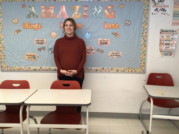 Mrs Chesney poses for a picture in her room.