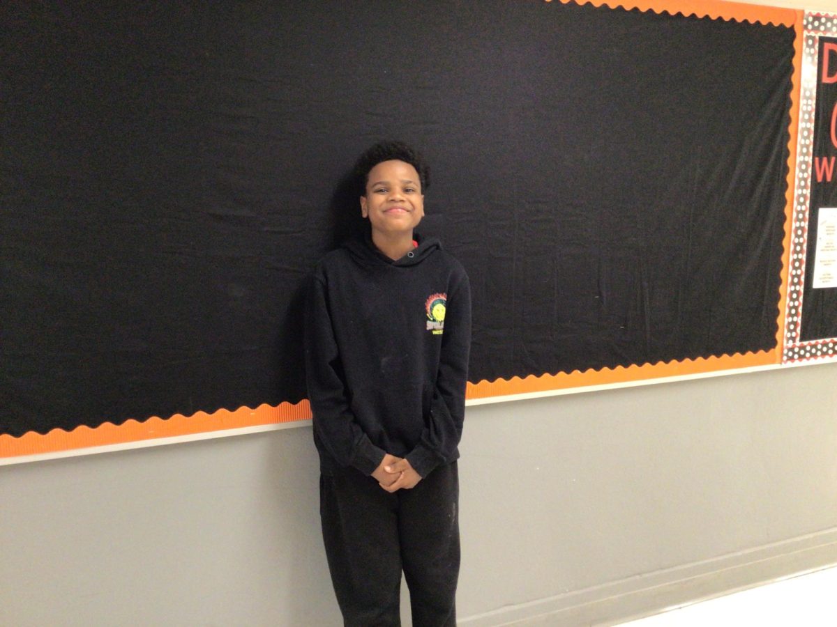 Royal B: Poses for a picture.