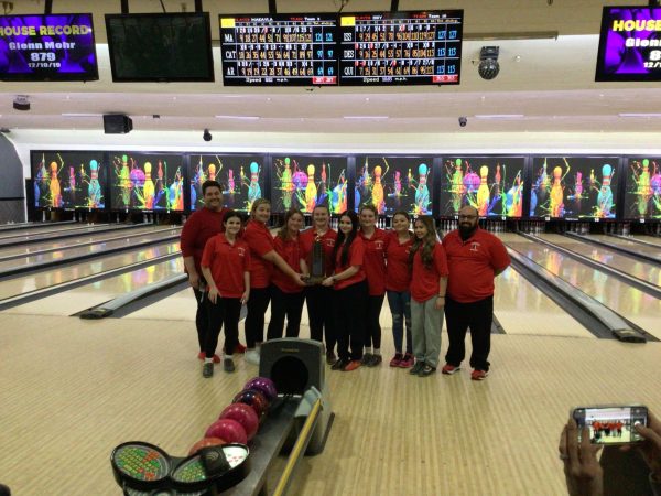 WMS girls bowling team with their trophy.
