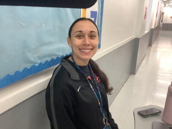 Ms. Nardoza poses for a picture in WMS.