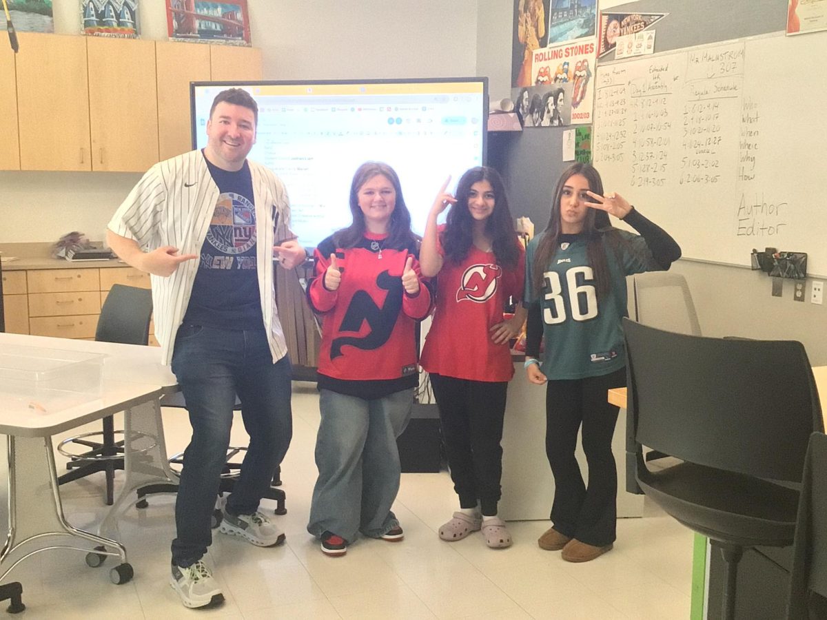 Mr.Malmstrom and students pose for a picture at WMS during the Week of Respect. 