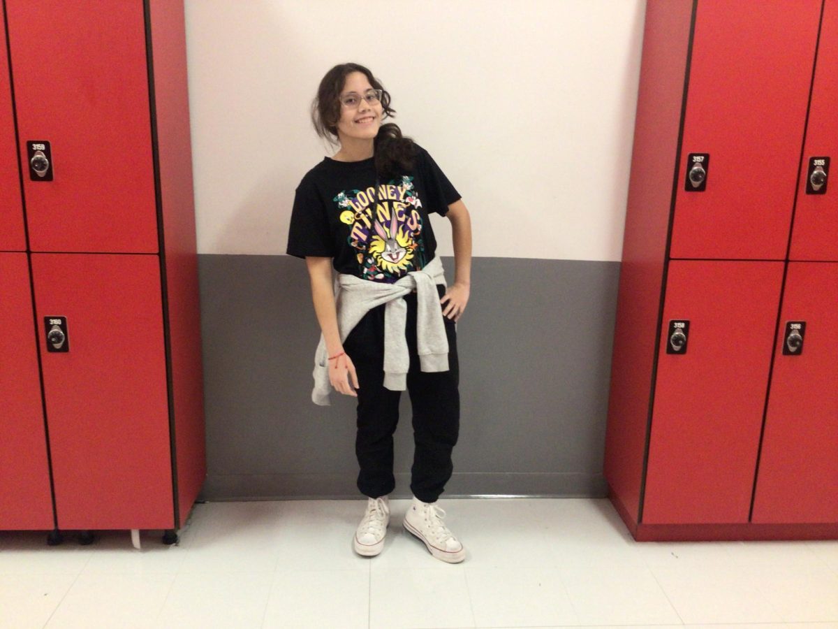 Adrianna Boniela poses between lockers in WMS.