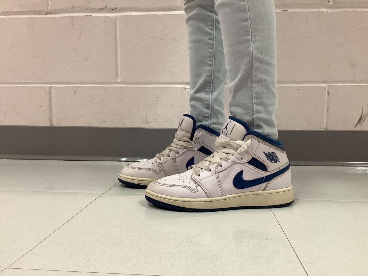  Ashley M shows her Air  Jordan 1 mid SE shoes at WMS during 4th period
