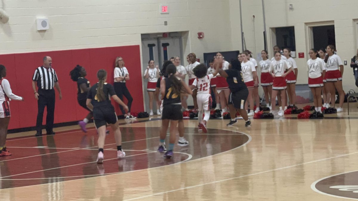 The Girl's Basketball Team at the White Out Game