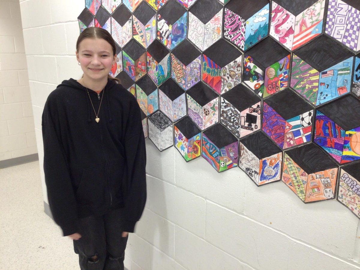 Shea poses for picture in WMS halls.