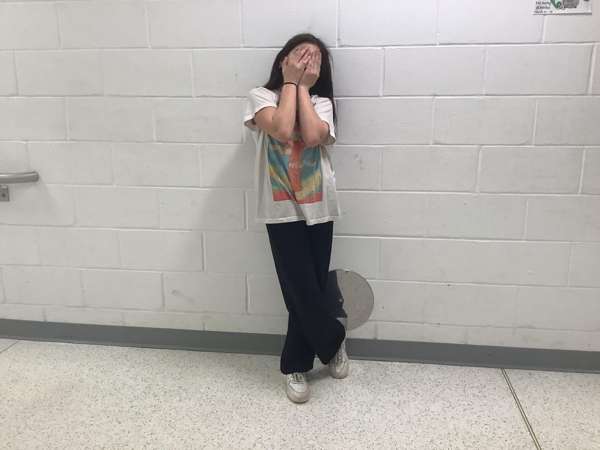 Emma Ventura poses for picture in WMS hallway.