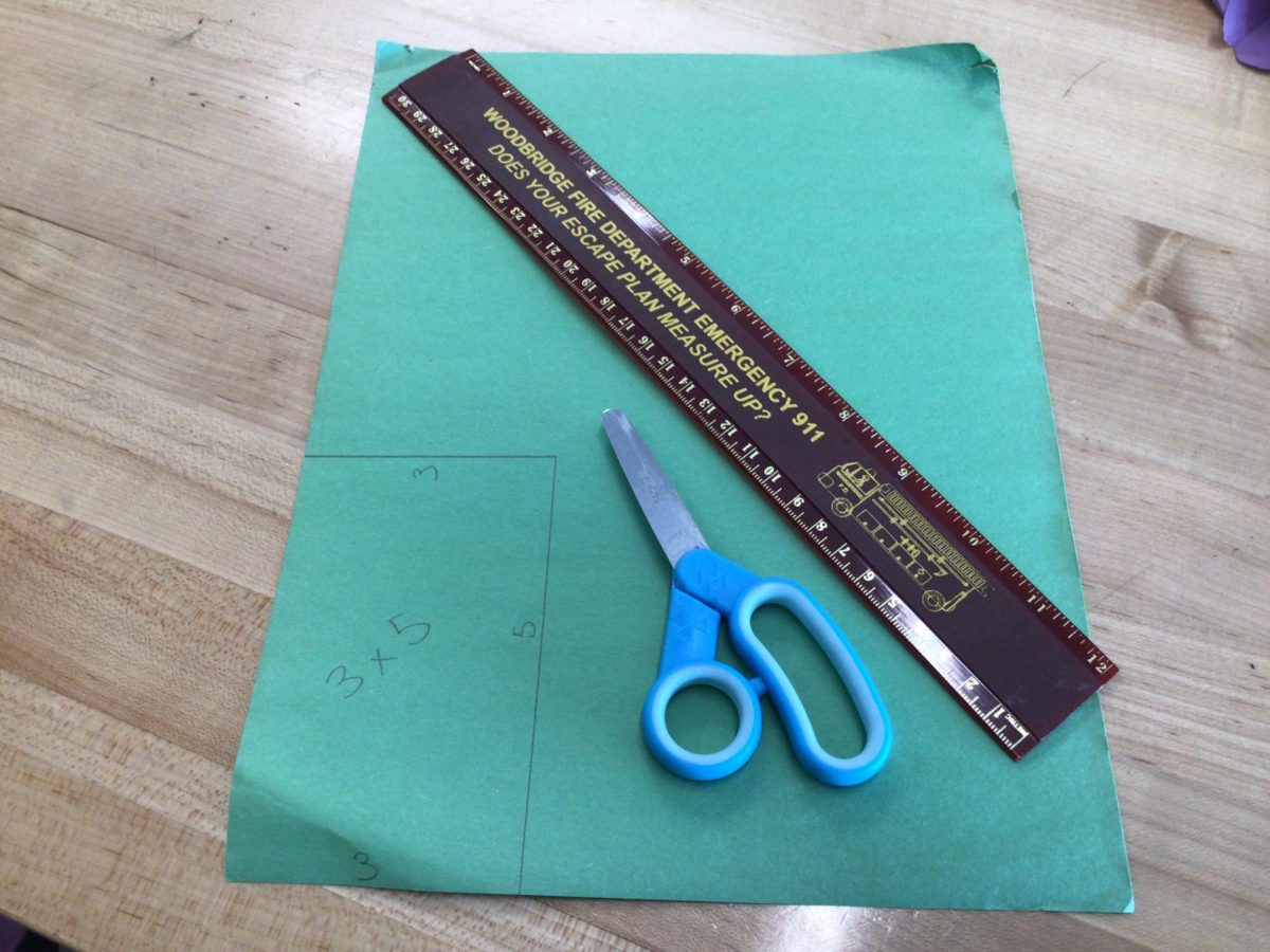 Step 11:
Get your green construction paper and draw a 3x5 rectangle and cut it out.