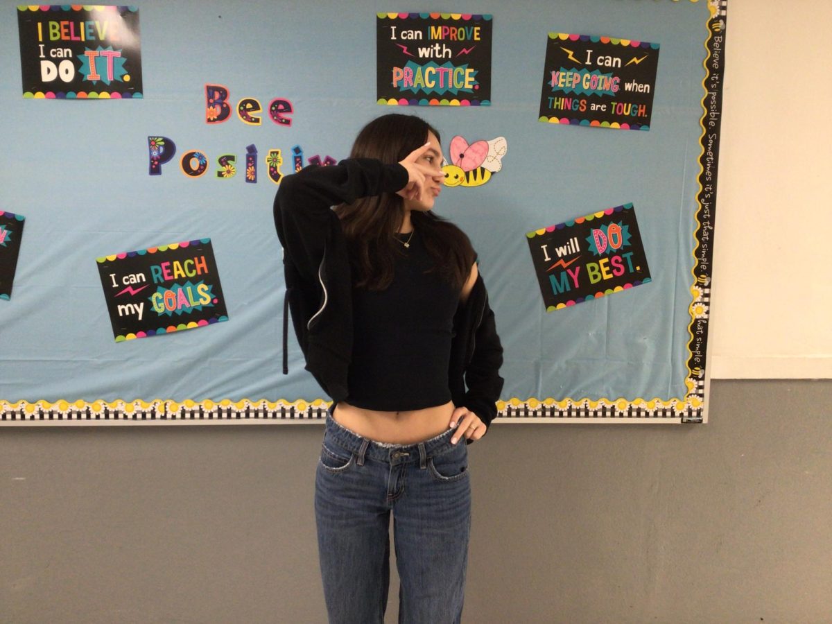 Delaney Fallon poses outside of health room