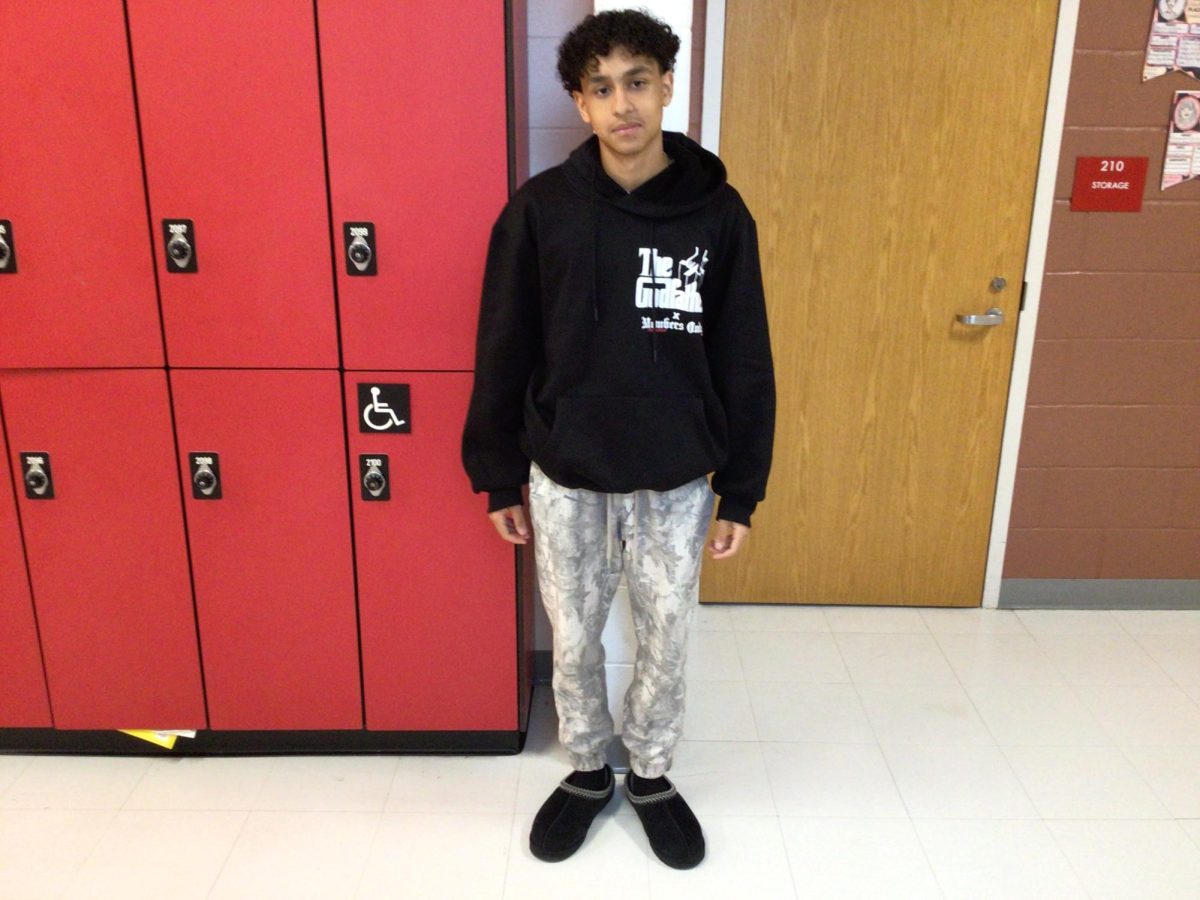 Gianny posing for photo in front up Mrs. Liastro