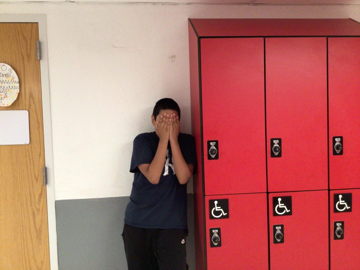 Zahir poses to get his photo taken.