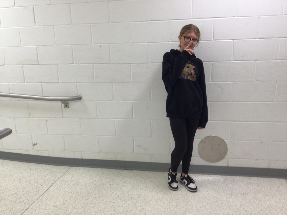Allison Zuber poses for a picture outside of the Gym 