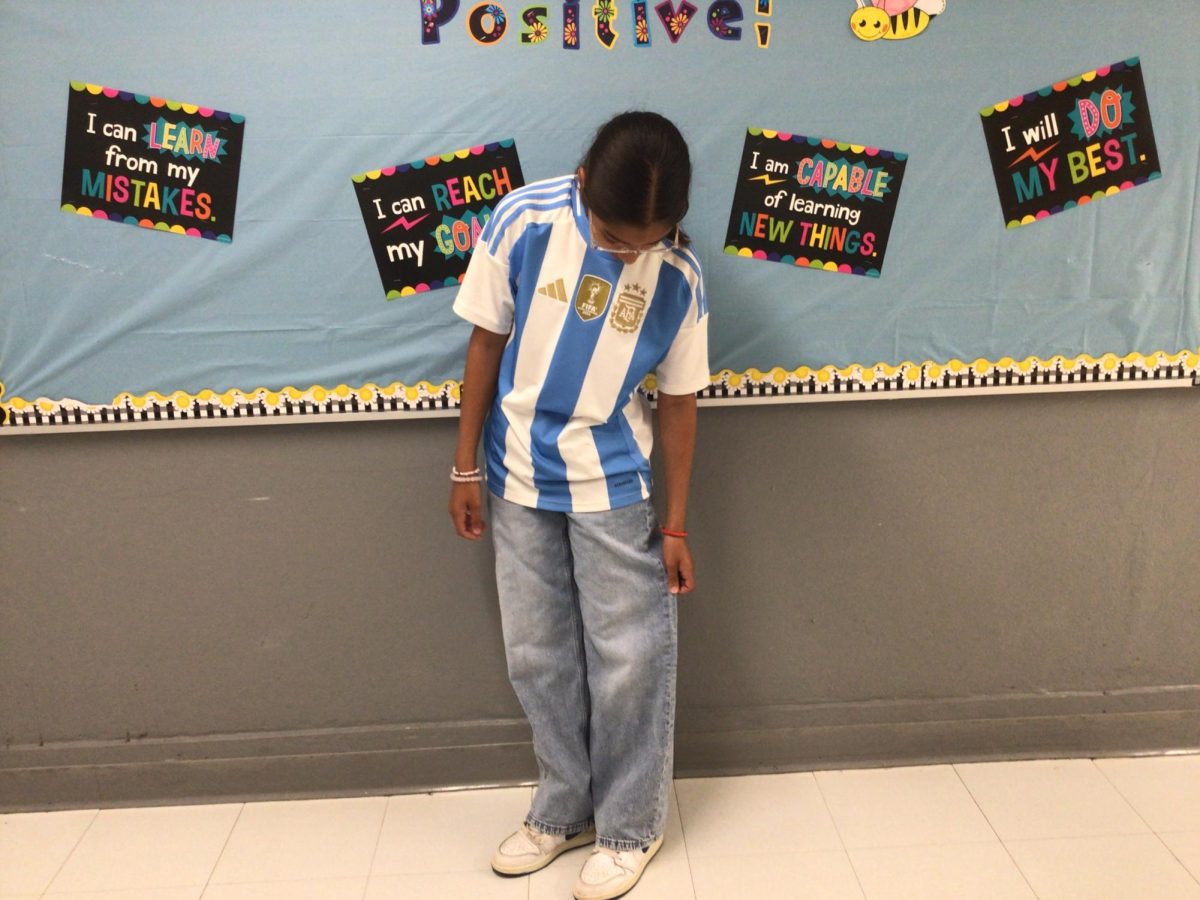 Ashley Magana poses for a picture outside of health room