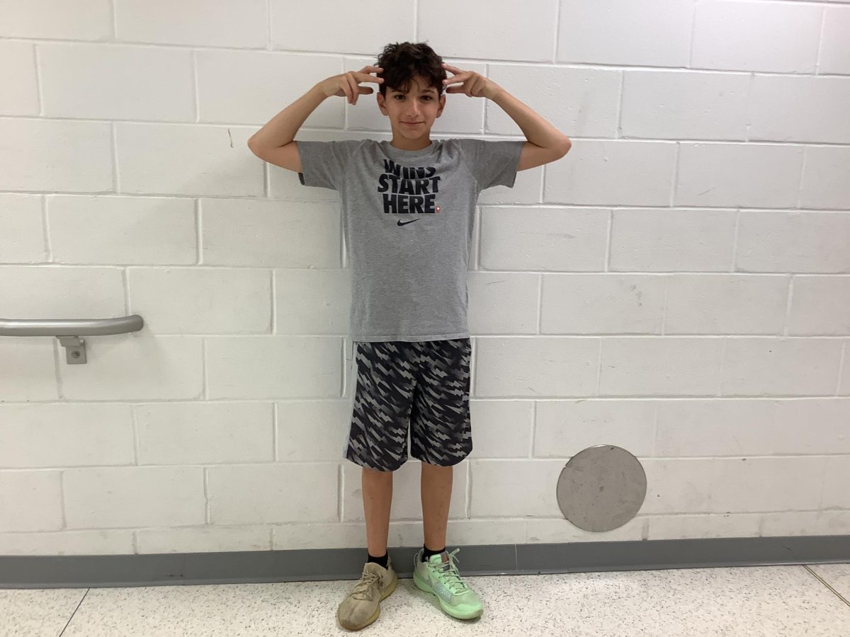 Dylan Dywer poses outside of gym.