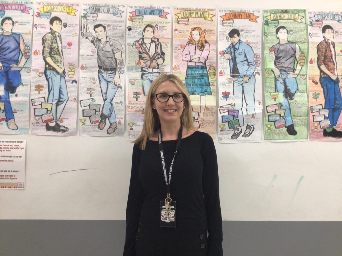 Mrs. Douglas poses for a picture