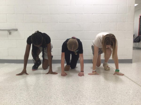 Hannah Amusa, Allison Zuber, and Alexa Dachowicz pose for a photo outside the art room on June 4th 2025. 