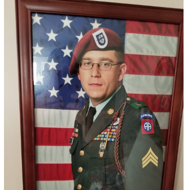 Micheal LaPoint poses for military photo