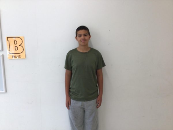 Patrick Alcantara, member of Peer Leaders, poses at WMS.