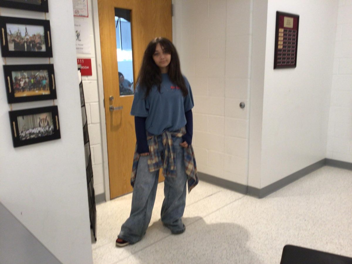 Aryanna Canela, a 7th grade  vocal music student, poses for a picture at WMS.