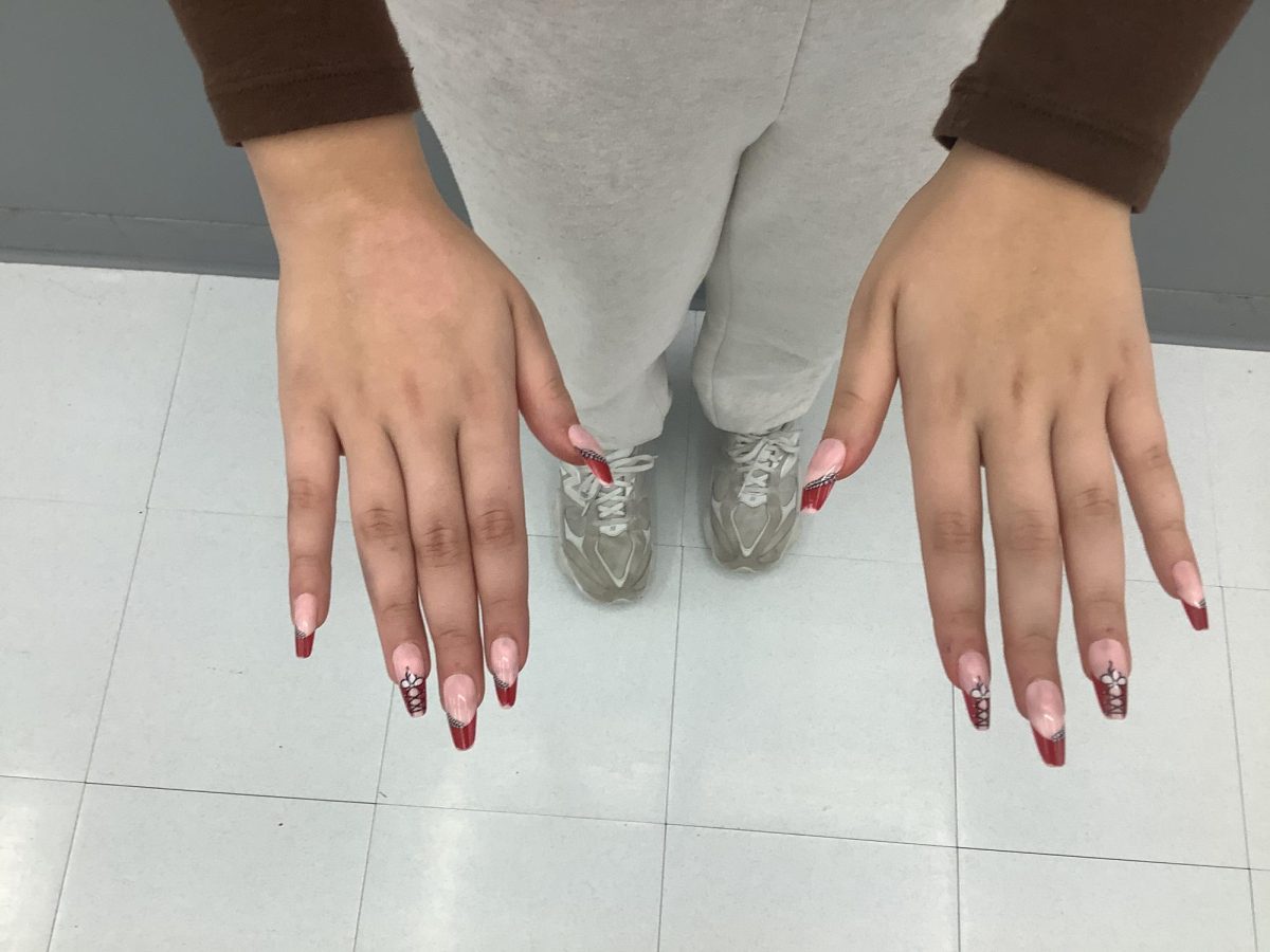 Zara Atif posed with her nails.