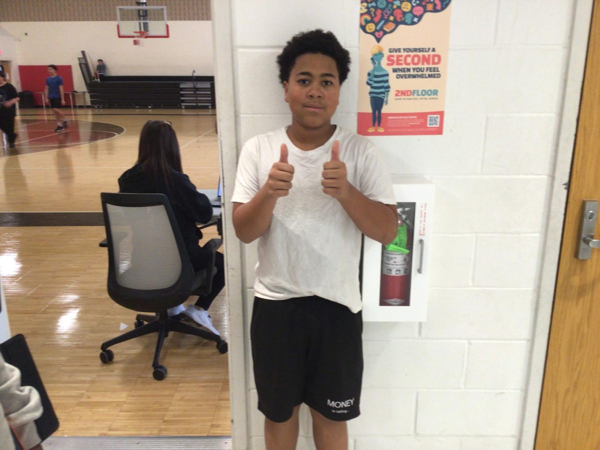 8th grader Kabeer Lewis said his dream is to go to the NFL and play Quarterback 