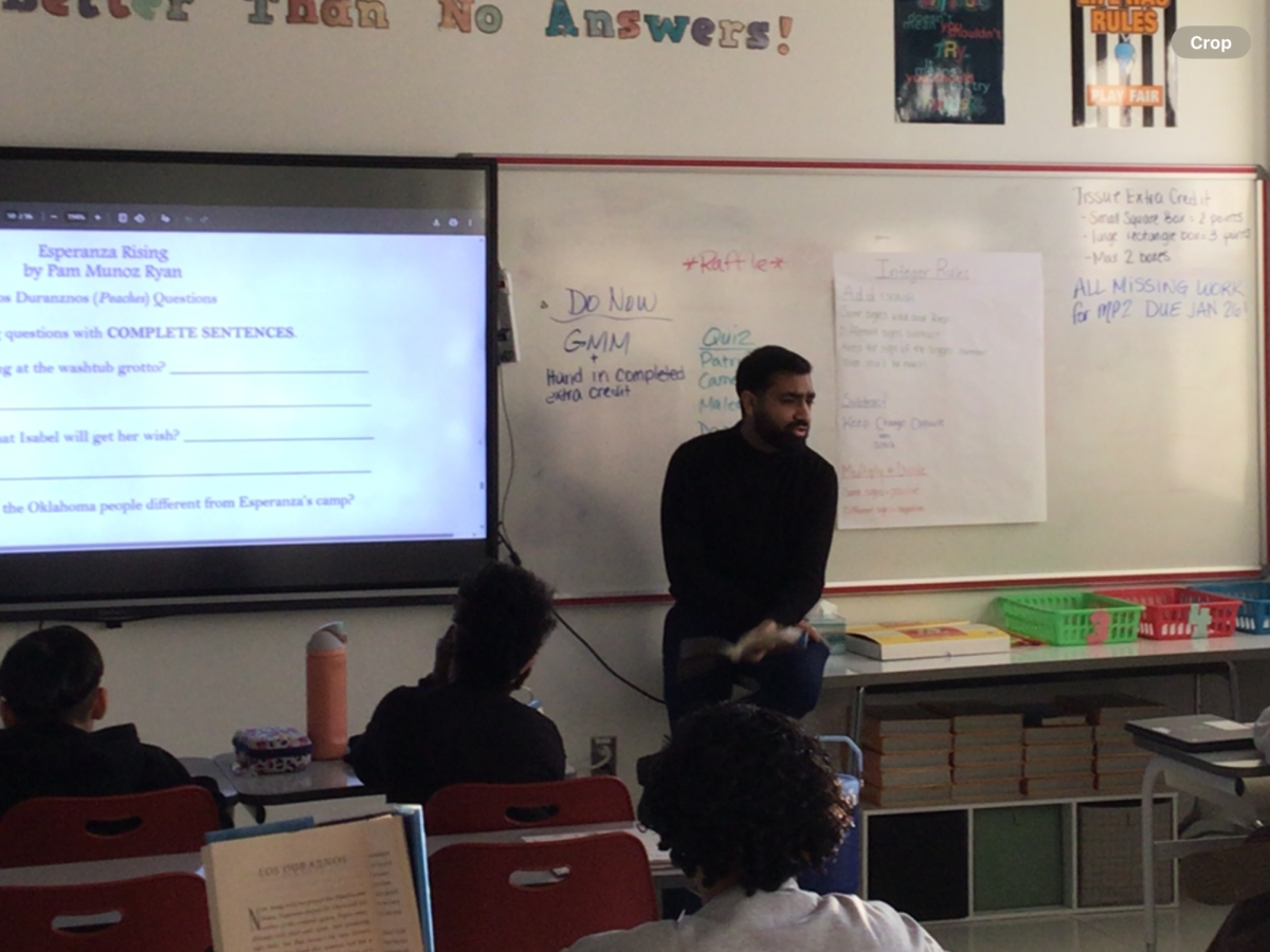 Mr. Ahmed teaches his 6th grade class.
