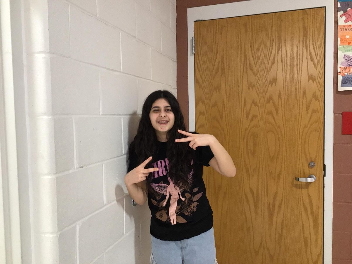 Gianna De Pinto Stands near room 307 at WMS 