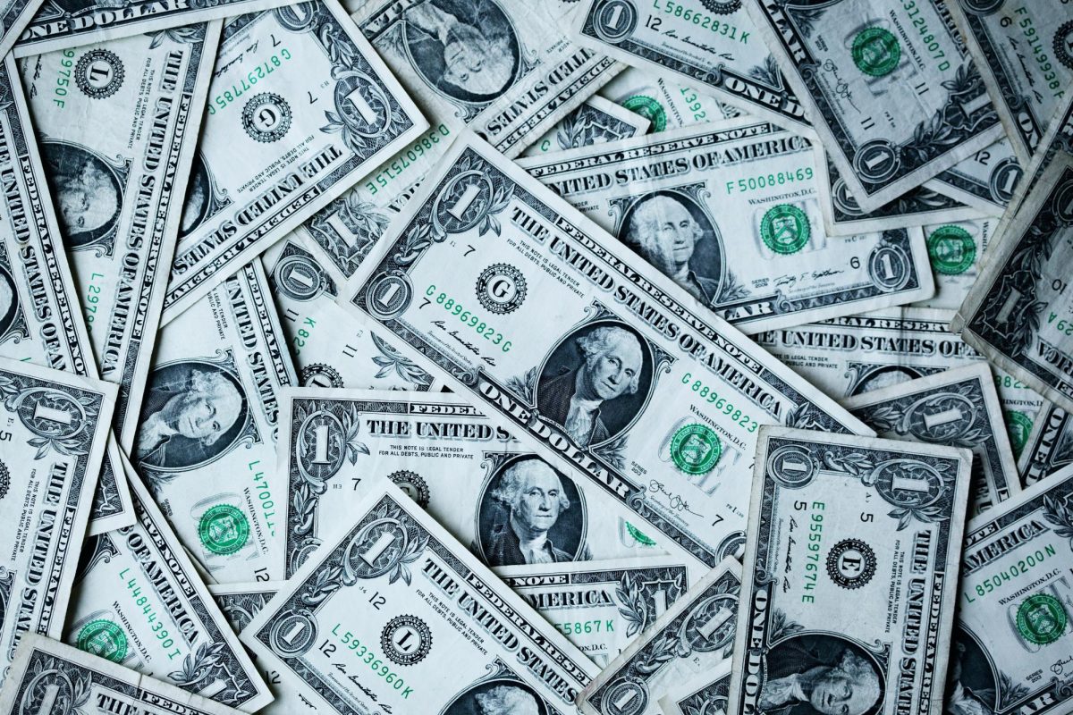 A picture of a pile of $1.00 bills. Picture from Unsplash.