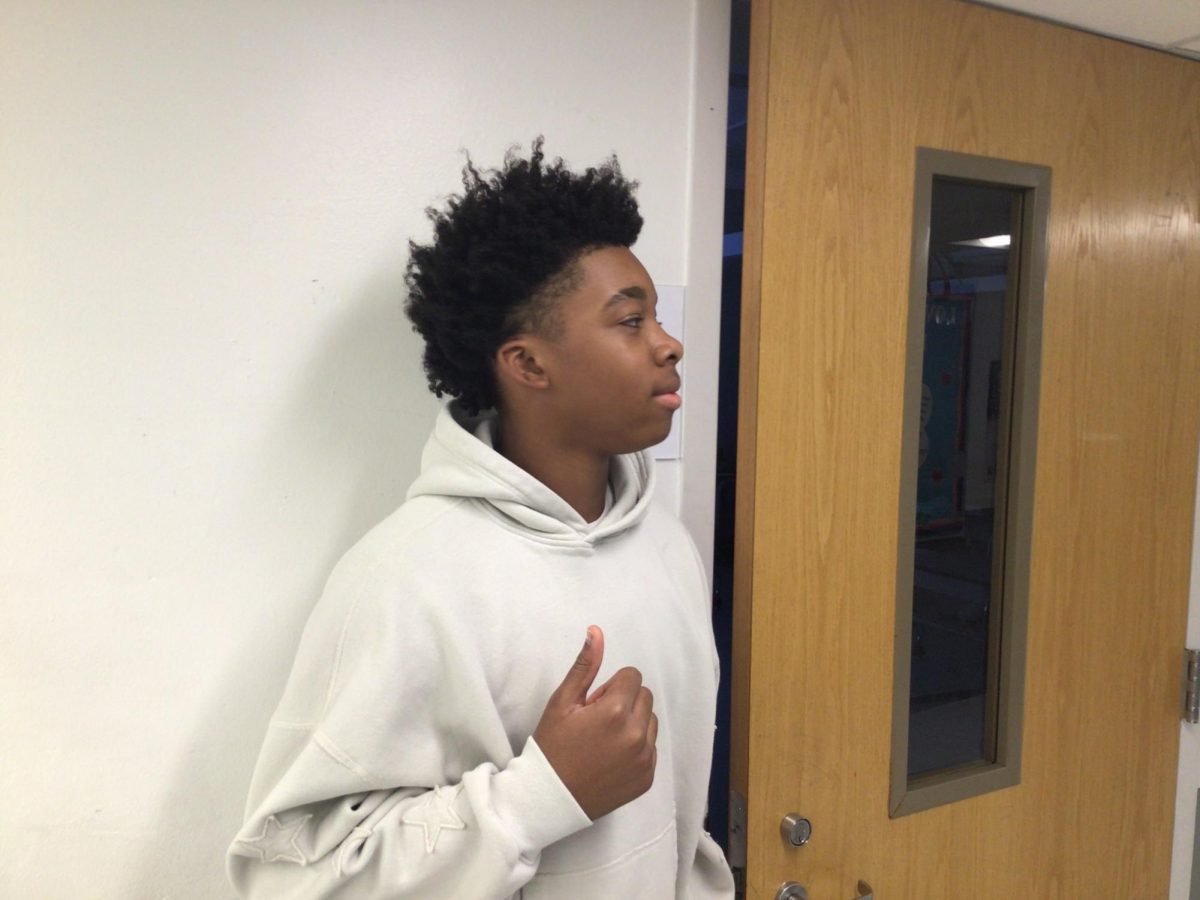 Aj Williams poses for a picture outside Health class.