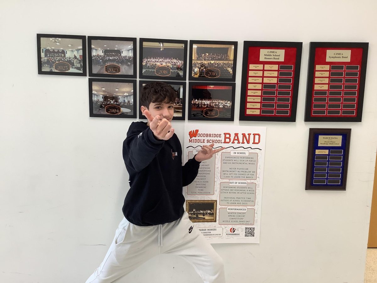 Dylan Dwyer poses outside of the WMS band room.
